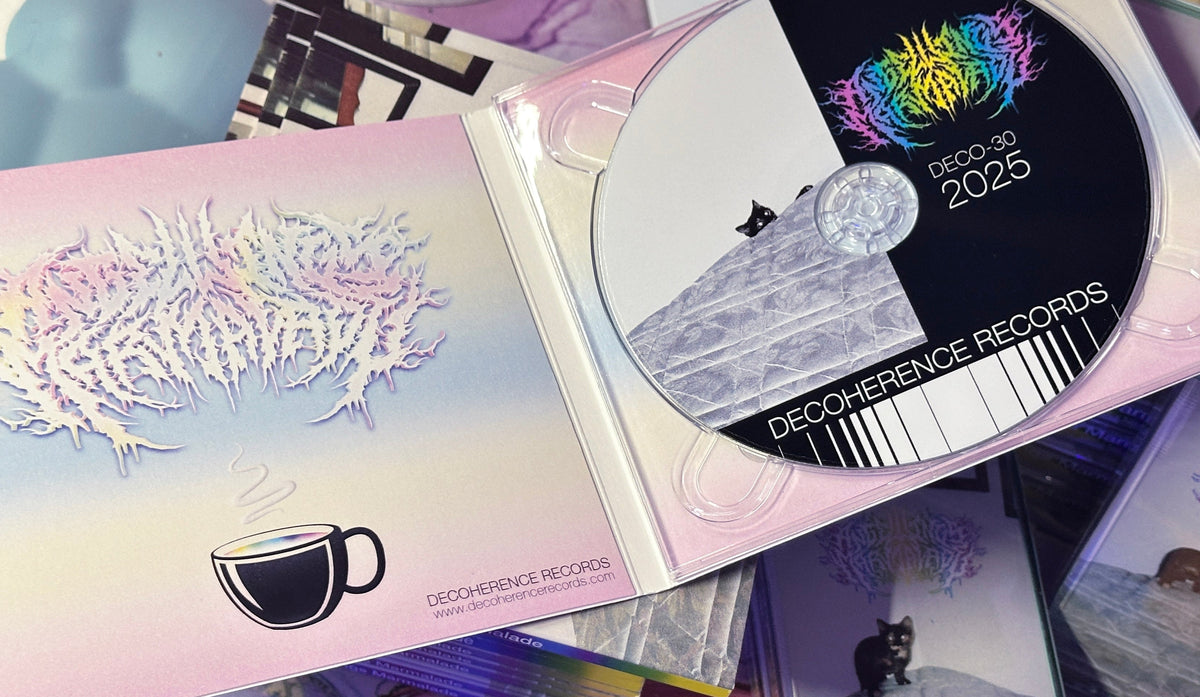 CD with cover featuring a coffee cup design and 'Decoherence Records' branding.