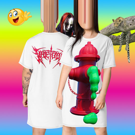 A person wearing a white oversized t-shirt with a red fire hydrant and green slime design on the front. The shirt features a loose fit and the individual is standing against a colorful background.