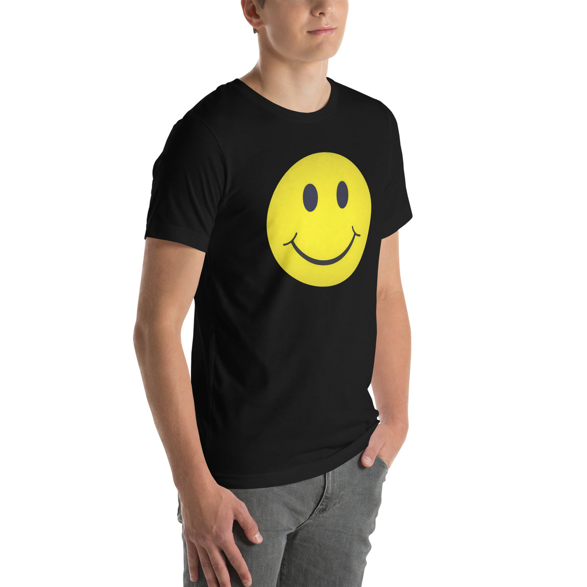Person wearing a black t-shirt with a yellow smiley face design on a white background