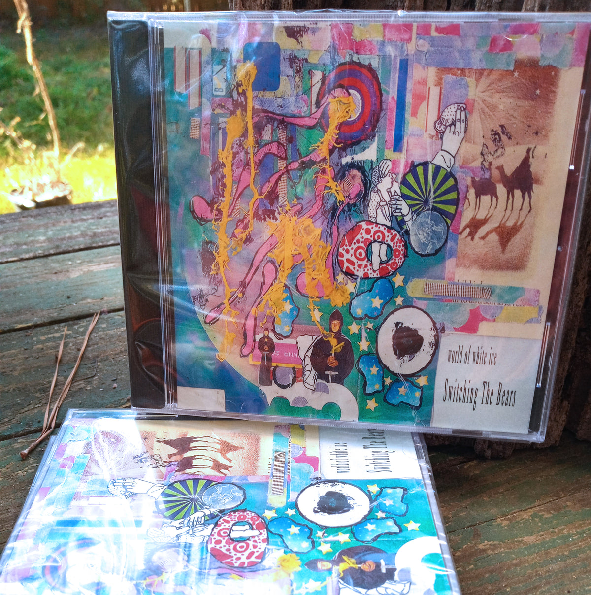 Colorful album cover with abstract designs on a wooden surface table