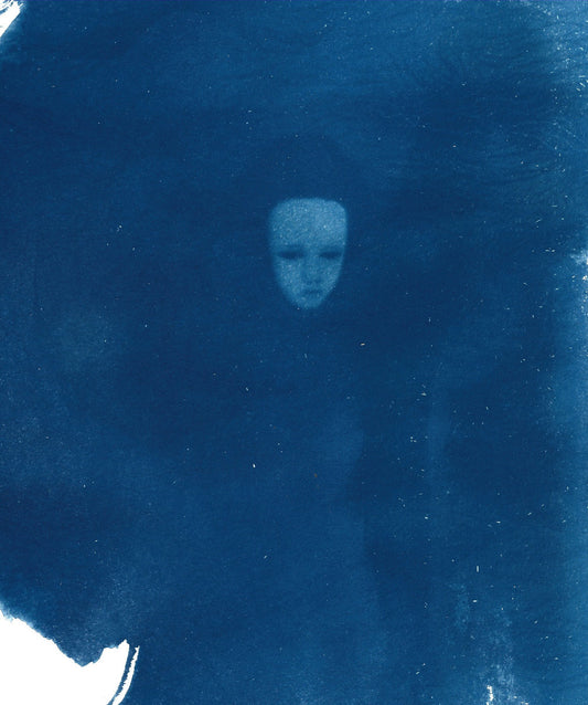 Blue-toned cyanotype artwork of a small pale sad looking face on a mostly dark blue background.
